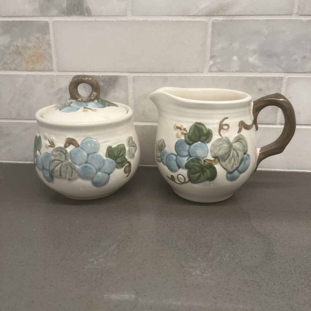 Vintage Metlox Poppytrail Sculptured Grape sugar and creamer set.
